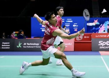 MELENGGANG MULUS: Ganda putra Sabar Karyaman Gutama/Moh Reza Pahlevi Isfahani mulus melewati babak pertama Singapore Open 2026. (Foto: Dok./PBSI)