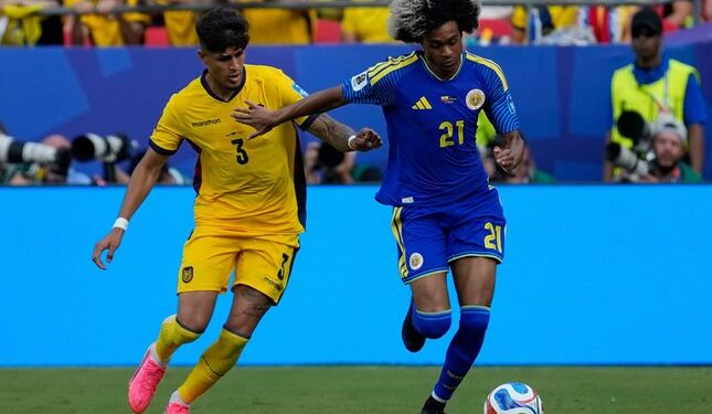 Ekuador vs Curacao Berakhir Dengan Skor Kacamata 1 AKHIR IMBANG: Piero Hincapie mencoba merebut bola dari kaki Tahith Chong di laga Piala Dunia 2026, Ekuador vs Curacao pada Minggu (21/6/2026). (Foto: (c) AP Photo/Charlie Riedel)