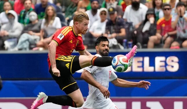 LAGA SERU: Aksi Kevin De Bruyne dalam laga Belgia vs Iran di Grup G Piala Dunia 2026 pada Senin (22/6/2026). (Foto: (c) AP Photo/Andre Penner)