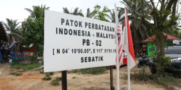 BATAS WILAYAH: Patok perbatasan 02 Indonesia-Malaysia terletak di Desa Aji Kuning, Kecamatan Sebatik Tengah, Kabupaten Nunukan. (Dok./Fery Herdiansyah/RRI Nunukan)