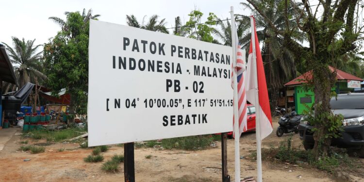 BATAS WILAYAH: Patok perbatasan 02 Indonesia-Malaysia terletak di Desa Aji Kuning, Kecamatan Sebatik Tengah, Kabupaten Nunukan. (Dok./Fery Herdiansyah/RRI Nunukan)