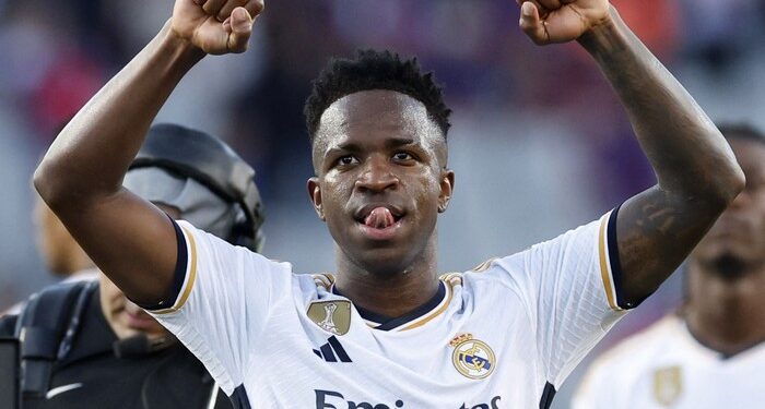 JADI INCARAN: Winger Timnas Brasil,  Vinicius Junior, masih asyik dengan Real Madrid. Dia tak bicara banyak soal isu Arsenal dikabarkan tertarik merekrutnya. Kontrak Vinicius Junior di Real Madrid akan berakhir pada musim panas 2027. (Foto: REUTERS/ALBERT GEA)