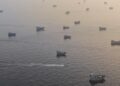 IRGC Buka Selat Hormuz Jika AS Bayar Kompensasi Perang 7 KOMPENSASI PERANG: Iran menegaskan tak akan membuka Selat Hormuz sebelum AS memenuhi syarat yang diajukan Teheran, termasuk pemberian kompensasi atas kerusakan akibat perang. (Foto: REUTERS/Stringer)