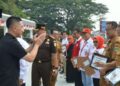 HUT KE-81 PMI: Bupati Lebak Moch. Hasbi Asyidiki Jayabaya (dua dari kiri) memberi salam kepada jajaran pejabat instansi yang mendukung kegiatan donor darah dalam rangkaian peringatan HUT ke-81 Palang Merah Indonesia (PMI) Kabupaten Lebak di Aula Alun-Alun Rangkasbitung pada Selasa (22/9/2026). (Foto: Dok./DiskominfoSP Kab. Lebak)