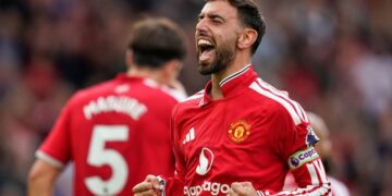 AKSI SELEBRASI: Pemain Manchester United Bruno Fernandes merayakan gol dalam laga Premier League Inggris antara Man Utd vs Ipswich Town di Manchester, Inggris pada Minggu (30/8/2026). (Foto: (c) AP Photo/Dave Thompson)