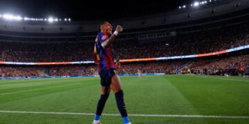 DEBUT POSITIF: Pemain Barcelona, Raphinha, merayakan gol keempat timnya dalam pertandingan La Liga melawan Rayo Vallecano pada Selasa (1/9/2026). (Foto: (AP Photo) (c) AP Photo/Joan Monfort)