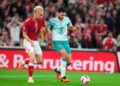DUEL SENGIT: Pemain Denmark Oliver Provstgaard dan pemain Portugal Goncalo Ramos beraksi dalam pertandingan UEFA Nations League pada Jumat (2/10/2026). (Foto: (c) Liselotte Sabroe/Ritzau Scanpix via AP)