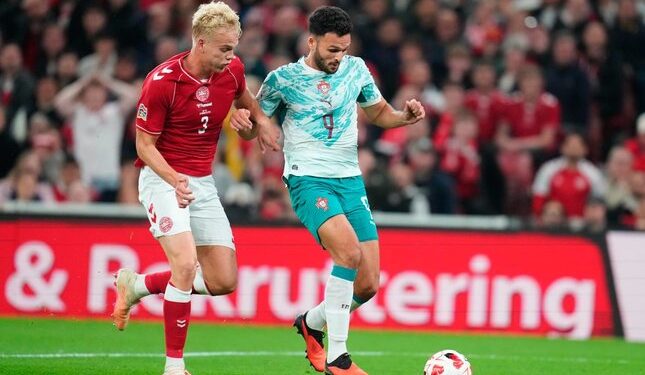 Portugal Hajar Denmark 4-2 di Laga UEFA Nations League A 1 DUEL SENGIT: Pemain Denmark Oliver Provstgaard dan pemain Portugal Goncalo Ramos beraksi dalam pertandingan UEFA Nations League pada Jumat (2/10/2026). (Foto: (c) Liselotte Sabroe/Ritzau Scanpix via AP)