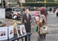 Tingkatkan Literasi Publik, Komunitas Melek Politik Bagikan Buku Gagasan Presiden di CFD Bundaran HI